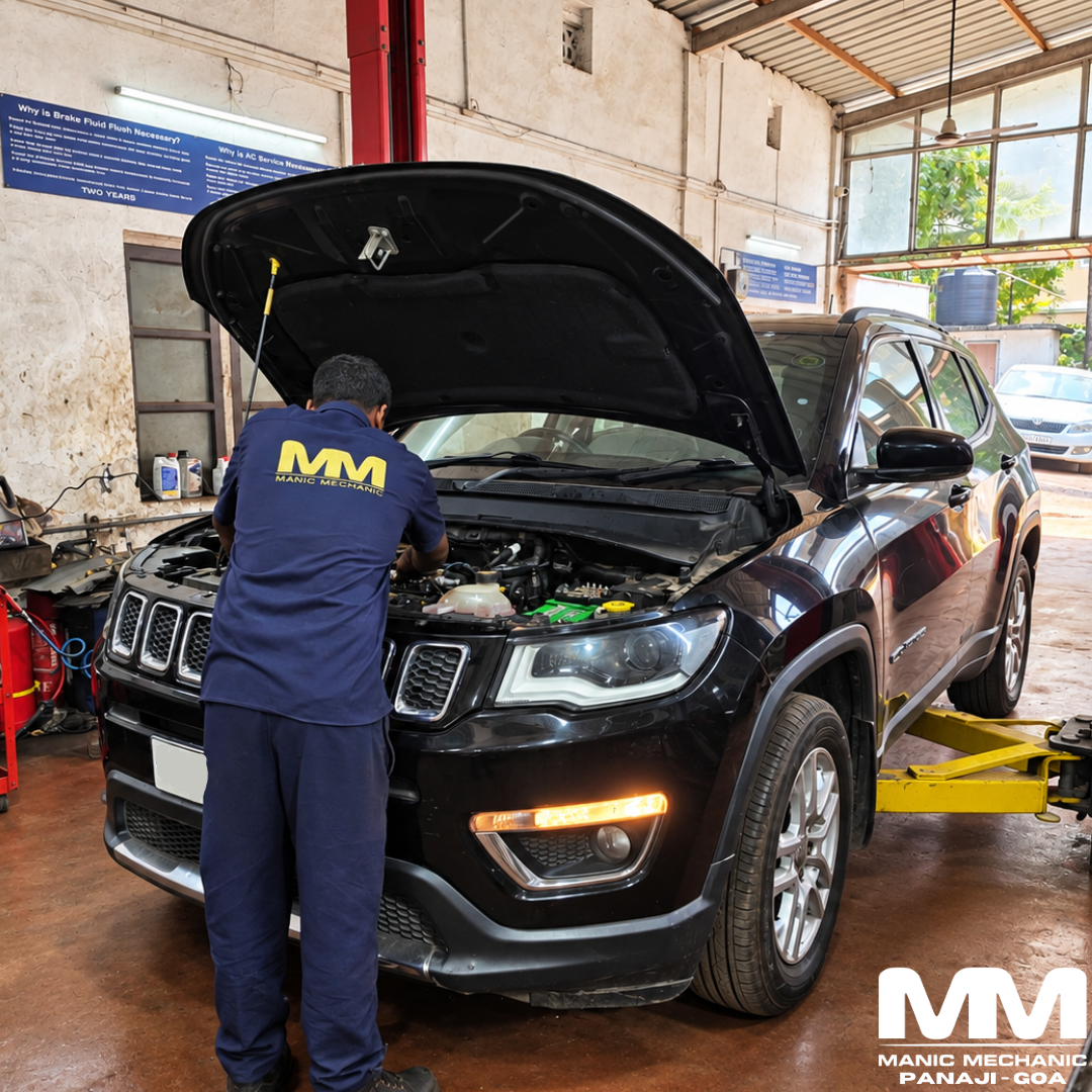 Technician working on a Jeep Compass at Manic Mechanic in Panaji, Goa